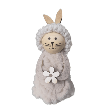 Stehender Hase aus Holz und Stoff. Es gibt ihn in 2 Farbkombinationen. 
Maße: Höhe ca. 12 cm
Material: Holz, Stoff, Filz, Strick
Farben: natur, weiß, creme
Lieferumfang: 1 Hase in der ausgesuchten Farbkombination