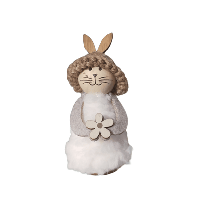 Stehender Hase aus Holz und Stoff. Es gibt ihn in 2 Farbkombinationen. 
Maße: Höhe ca. 12 cm
Material: Holz, Stoff, Filz, Strick
Farben: natur, weiß, creme
Lieferumfang: 1 Hase in der ausgesuchten Farbkombination