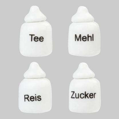 4 Dosen aus Porzellan für Tee, Mehl, Reis und Zucker als Zubehör Wichteltür. Das sollte in keiner Küche fehlen.
