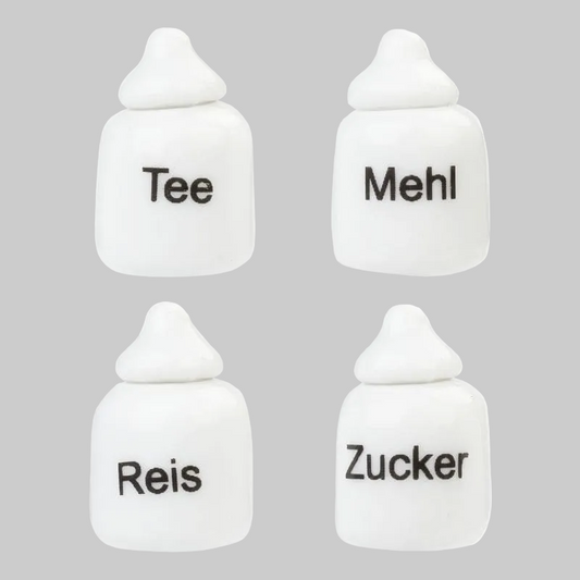 4 Dosen aus Porzellan für Tee, Mehl, Reis und Zucker als Zubehör Wichteltür. Das sollte in keiner Küche fehlen.