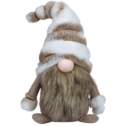 Dieser braun weiße Wichtel mit seiner braun weißen Plüschmütze und den Handschuhen, erinnert doch sehr an einen Eskimo. Nur die Nase schaut unter der sehr langen Mütze hervor. Höhe: ca. 40,0 cm - Material: Filz, Plüsch - Farben: braun, weiß