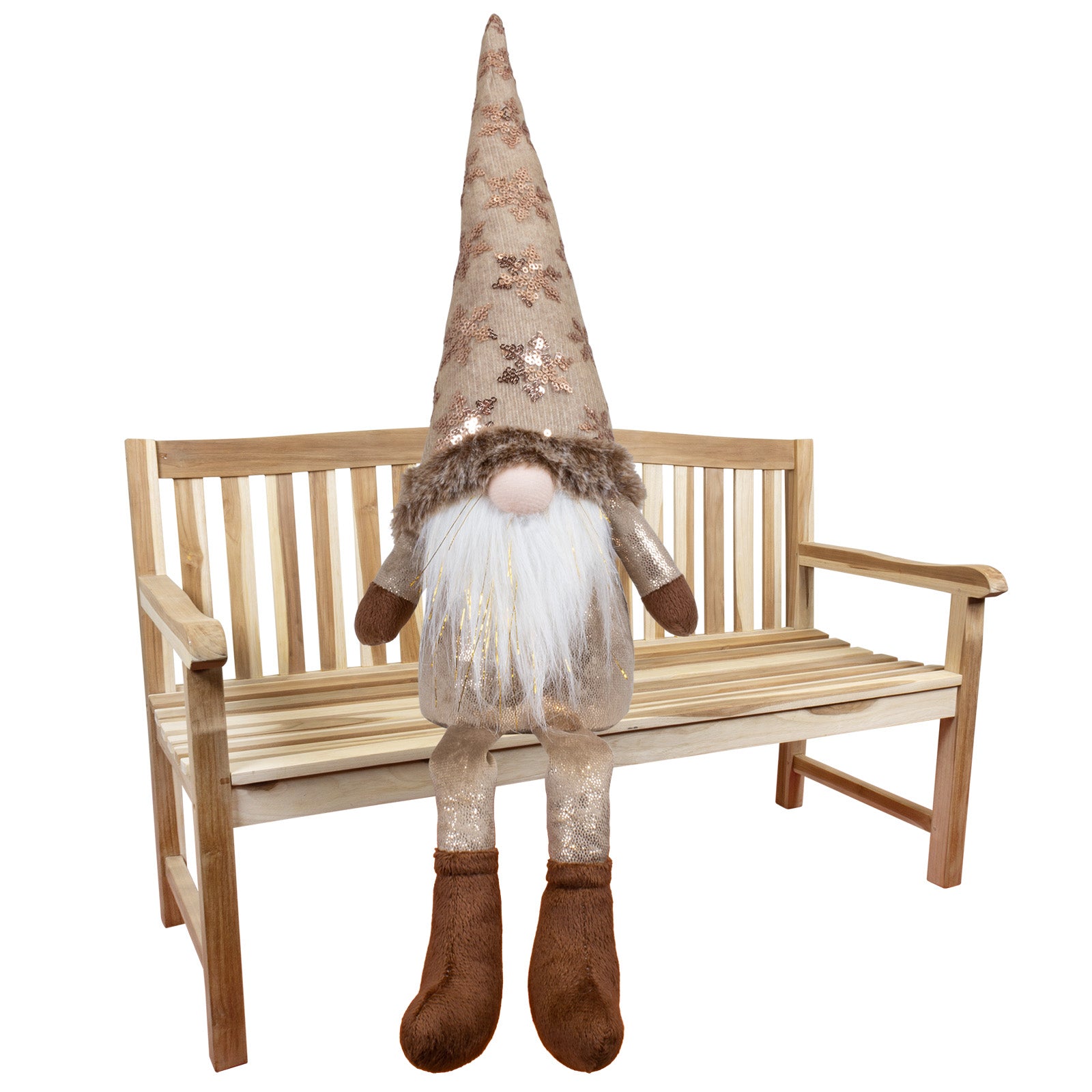 Wichtel als Kantenhocker mit einer Stoffmütze. Die Mütze ist mit Pailletten in Form von Schneeflocken besetzt. Im weißen Bart sind dezente Goldsträhnen eingearbeitet. Dadurch bekommt der Wichtel eine sehr edle und erhabene Optik. Höhe: ca. 55 cm (Gesamtlänge vom Fuß bis zum Ender der langgezogenen Mütze) - Material: Stoff, Samt, Pailletten, Fell - Farben: braun, bronze