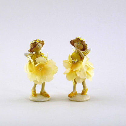 Elfe Seidenblume - stehend - in gelb. Es gibt sie in 2 Ausführungen. 
Maße: Höhe ca. 9,5 cm 
Material: Polyresin, Kunststoff 
Farben: gelb 
Lieferumfang: 1 Elfe in der ausgesuchten Variante